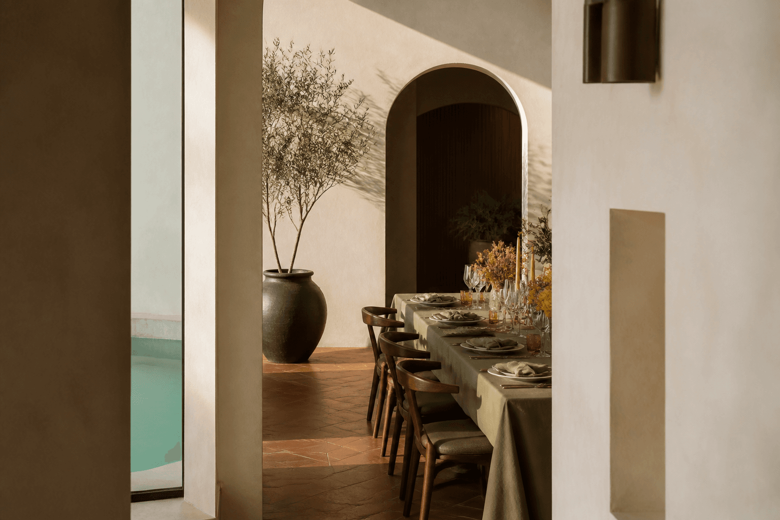 A warm modernist dining room set for a private gathering
